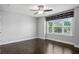 Well-lit bedroom with hardwood floors and large window at 614 Denali Dr, Mableton, GA 30126