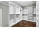 Walk-in closet with built-in shelving and ample storage space at 614 Denali Dr, Mableton, GA 30126