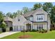 Beautiful two-story home with a well-manicured lawn and attached two-car garage at 614 Denali Dr, Mableton, GA 30126