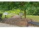 Vinings Summit nature trail entrance with signage, bench, and walking path at 614 Denali Dr, Mableton, GA 30126