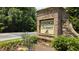 Elegant community signage for Vinings Summit, surrounded by lush landscaping at 614 Denali Dr, Mableton, GA 30126