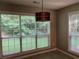 Cozy breakfast nook filled with natural light, providing a peaceful spot to enjoy morning coffee at 5415 Windcrest Ln, Suwanee, GA 30024