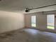 A spacious two car garage with windows for natural light at 5415 Windcrest Ln, Suwanee, GA 30024