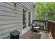 Outdoor deck with seating, providing a comfortable space for relaxation and enjoying the scenery in an outdoor setting at 1154 Village Se Ct, Atlanta, GA 30316