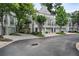 Inviting exteriors showcasing garages, walkways, and mature trees at 1154 Village Se Ct, Atlanta, GA 30316