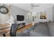 This bright living room opens to the kitchen and staircase at 1154 Village Se Ct, Atlanta, GA 30316