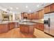Spacious kitchen with granite countertops, wood cabinets, and stainless steel appliances at 1527 Sage Ridge Dr, Marietta, GA 30064