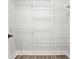 Walk-in closet with adjustable shelving and ample storage space at 556 Paines Nw Ave, Atlanta, GA 30318