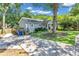 The beautiful home features a charming porch, complemented by a driveway, side deck, and beautiful landscape at 111 Marona Street Ne Ne St, Atlanta, GA 30307