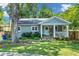 Charming single-story home featuring a welcoming front porch and well-manicured lawn and landscape at 111 Marona Street Ne Ne St, Atlanta, GA 30307