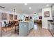 Open floorplan with kitchen, island, dining area, and living room in a bright, spacious home at 111 Marona Street Ne Ne St, Atlanta, GA 30307