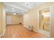 Spacious basement area with wood floors, recessed lighting, and bathroom for flexible use at 3436 Laurelwood Ne Ct, Roswell, GA 30075
