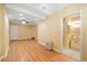 Finished basement with a full bathroom, tile flooring, and ample space for entertaining at 3436 Laurelwood Ne Ct, Roswell, GA 30075