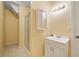 Bright bathroom featuring a shower with glass door, a vanity, and a large mirror at 3436 Laurelwood Ne Ct, Roswell, GA 30075