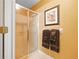 Bathroom shower with sliding doors and towel rack, offering convenience and functionality at 3436 Laurelwood Ne Ct, Roswell, GA 30075