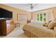 Bedroom with a large bed, view of the window and a TV with a dresser at 3436 Laurelwood Ne Ct, Roswell, GA 30075