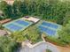 Aerial shot of well-maintained tennis courts offering a great recreational amenity at 3436 Laurelwood Ne Ct, Roswell, GA 30075