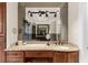 Bathroom vanity features a granite countertop and large mirror that expands the room's aesthetics at 932 Shadowford Fls, Lithonia, GA 30058