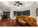 Living area with modern sofa, floor to ceiling windows and wet bar at 932 Shadowford Fls, Lithonia, GA 30058