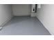 The basement features epoxy flooring and a water heater at 4990 Arbor View Nw Pkwy, Acworth, GA 30101