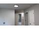 Bathroom featuring white trim, neutral paint, and a door leading to another room at 4990 Arbor View Nw Pkwy, Acworth, GA 30101
