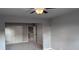 Bedroom features neutral walls, carpet, and a double-door closet at 4990 Arbor View Nw Pkwy, Acworth, GA 30101