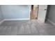 Bedroom features neutral walls, clean baseboards, and plush gray carpet at 4990 Arbor View Nw Pkwy, Acworth, GA 30101