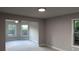 Open bonus room with neutral walls, carpet, and double windows at 4990 Arbor View Nw Pkwy, Acworth, GA 30101