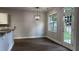 Dining area with hanging light fixture and view to backyard at 4990 Arbor View Nw Pkwy, Acworth, GA 30101