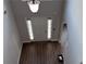 Bright entryway featuring a classic light fixture and hardwood floors with a view of the front door at 4990 Arbor View Nw Pkwy, Acworth, GA 30101