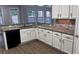 Kitchen featuring granite countertops and modern appliances at 4990 Arbor View Nw Pkwy, Acworth, GA 30101