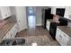 Open concept kitchen with bar top and modern appliances at 4990 Arbor View Nw Pkwy, Acworth, GA 30101