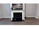Living room with fireplace, mantel, and gray walls at 4990 Arbor View Nw Pkwy, Acworth, GA 30101