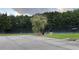Photo of the community's well-maintained tennis courts with a surrounding lush green tree line at 4990 Arbor View Nw Pkwy, Acworth, GA 30101