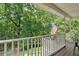 Inviting porch offering views of the surrounding landscape, a peaceful retreat at 1341 Little Deer Run, Canton, GA 30114