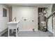 Utility room with sink and water heater at 1348 Branchwood Dr, Snellville, GA 30078