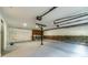 Spacious two car garage with exposed ceiling at 1348 Branchwood Dr, Snellville, GA 30078