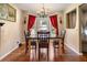 Cozy dining room with hardwood floors and plenty of natural light at 2208 Mountain Springs Nw Ct, Kennesaw, GA 30144