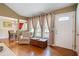 Inviting living area with hardwood floors and large windows at 2208 Mountain Springs Nw Ct, Kennesaw, GA 30144