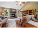 Comfortable living room with a stone fireplace, hardwood floors, and a vaulted ceiling at 2208 Mountain Springs Nw Ct, Kennesaw, GA 30144