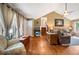 Spacious living room featuring hardwood floors, ample seating, and natural light at 2208 Mountain Springs Nw Ct, Kennesaw, GA 30144