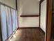 Bedroom with hardwood floors, natural light and a built-in shelf at 2917 Katherine Valley Rd, Decatur, GA 30032