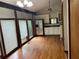 Open living room area with hardwood floors and large window views at 2917 Katherine Valley Rd, Decatur, GA 30032