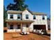 Exterior of new construction with visible framework and materials, awaiting finishing touches at 496 Charleston Pl, Villa Rica, GA 30180