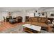 Finished basement with sofas, a pool table, an exercise area and beautiful decor at 9125 Patrick Pl, Winston, GA 30187