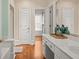 Bright bathroom featuring a large vanity with and sinks at 9125 Patrick Pl, Winston, GA 30187