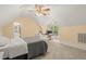 Bedroom with large windows, a ceiling fan and plenty of natural light and attached bathroom at 9125 Patrick Pl, Winston, GA 30187
