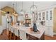 Gourmet kitchen with stainless steel appliances, granite countertops, and a large center island at 9125 Patrick Pl, Winston, GA 30187