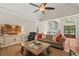 Spacious living room with natural light, hardwood floors, and stylish furnishings at 9125 Patrick Pl, Winston, GA 30187