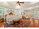 Large main bedroom with ensuite bathroom, lots of light, and decorative rug at 9125 Patrick Pl, Winston, GA 30187